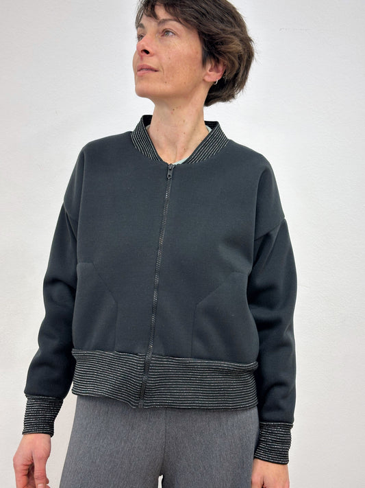 Jaqueta gruixuda negre i brilli