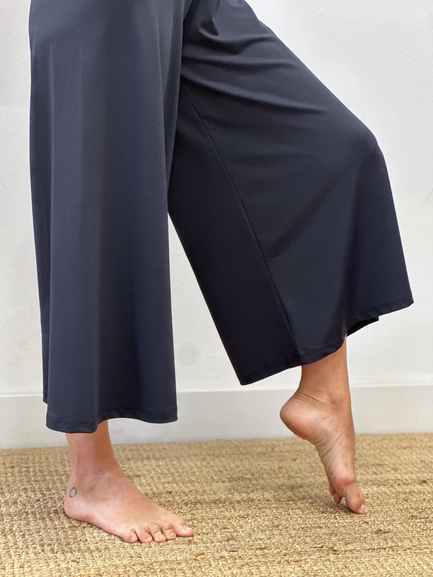 Pantalons amples de licra negres