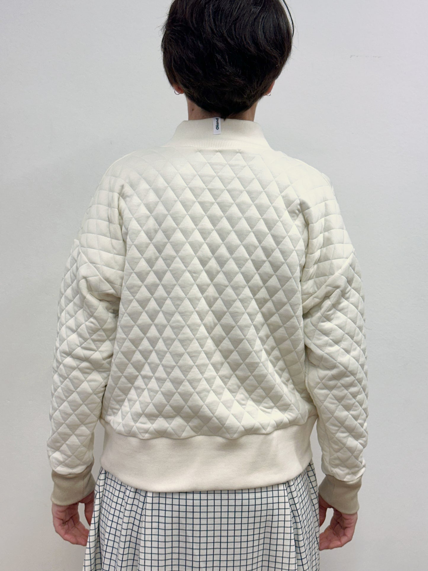 Jaqueta acolxada blanc cru