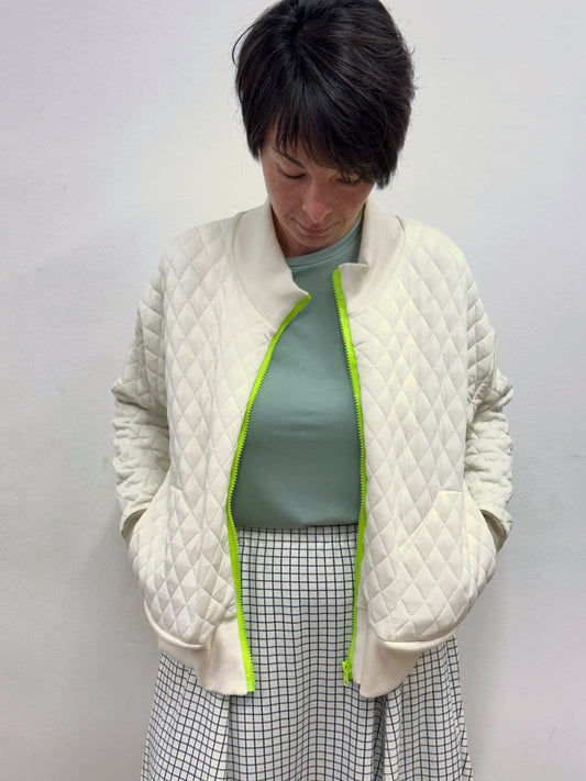 Jaqueta acolxada blanc cru