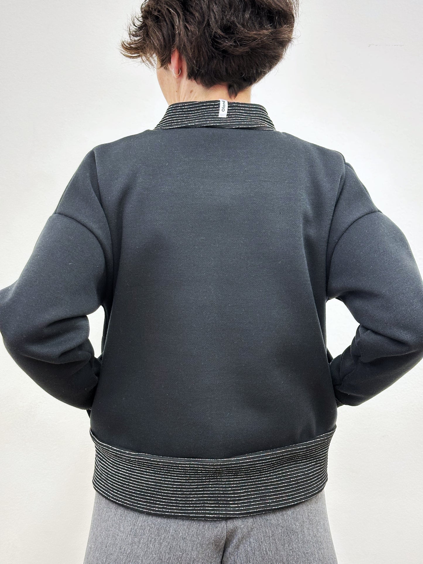 Jaqueta gruixuda negre i brilli