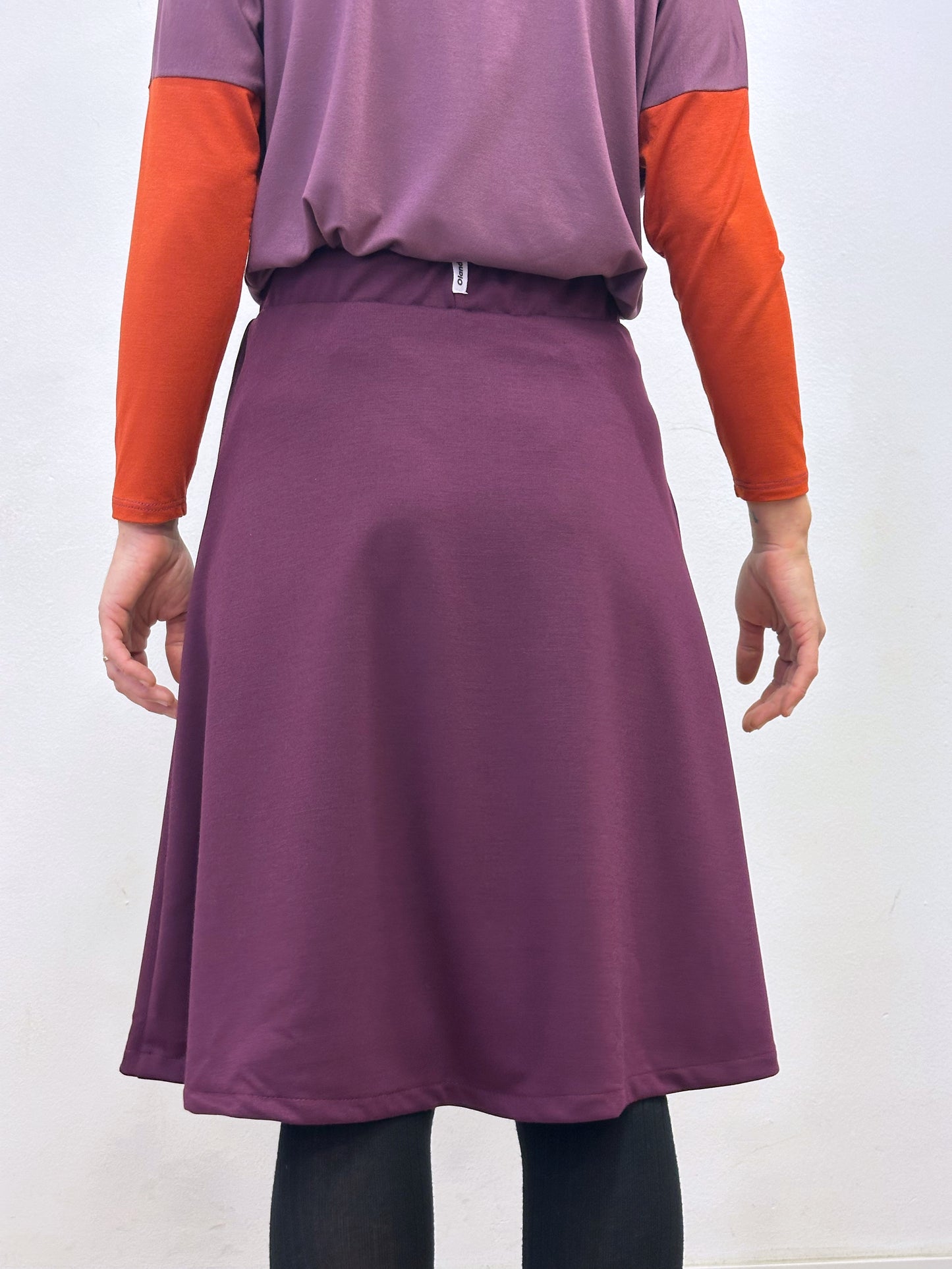 Faldilla amb tall central lila