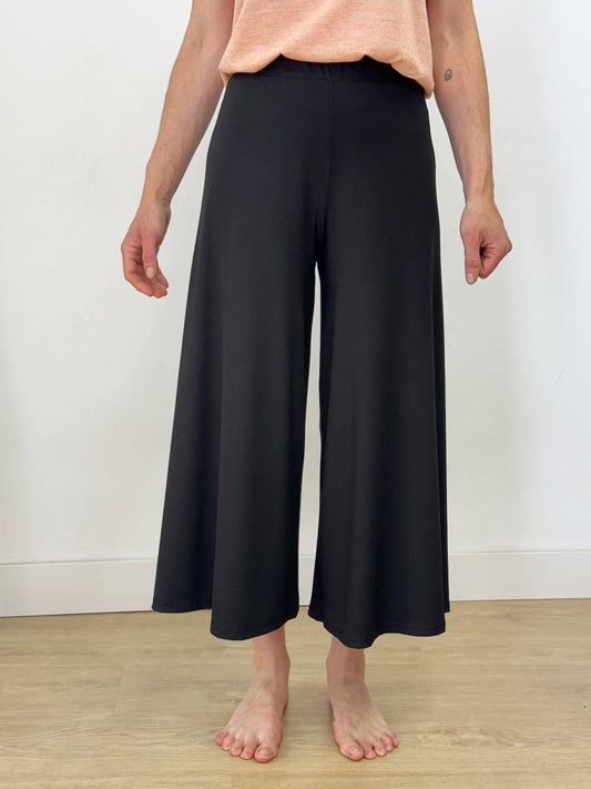Pantalons amples negres Essencials