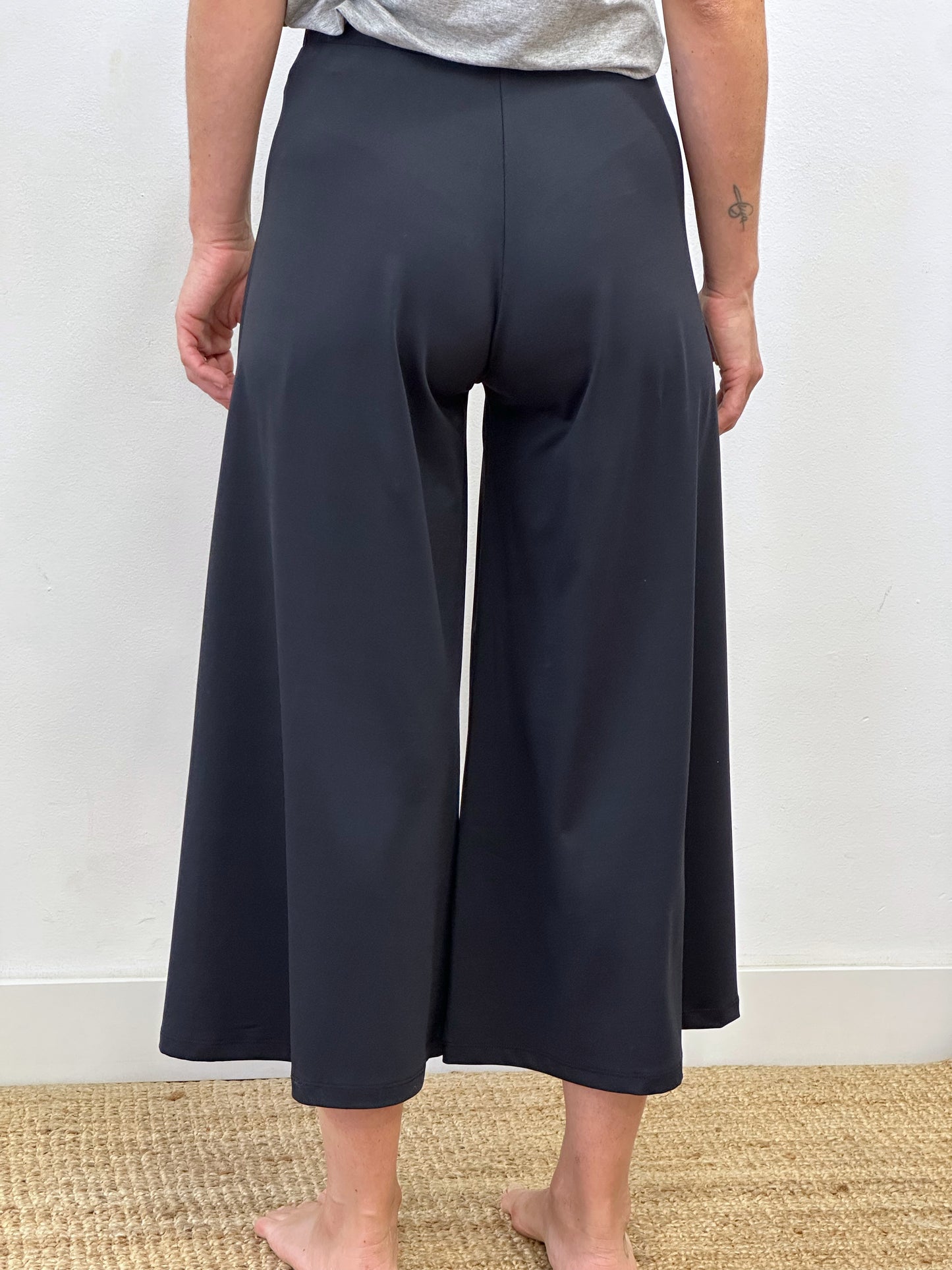 Pantalons amples de licra negres