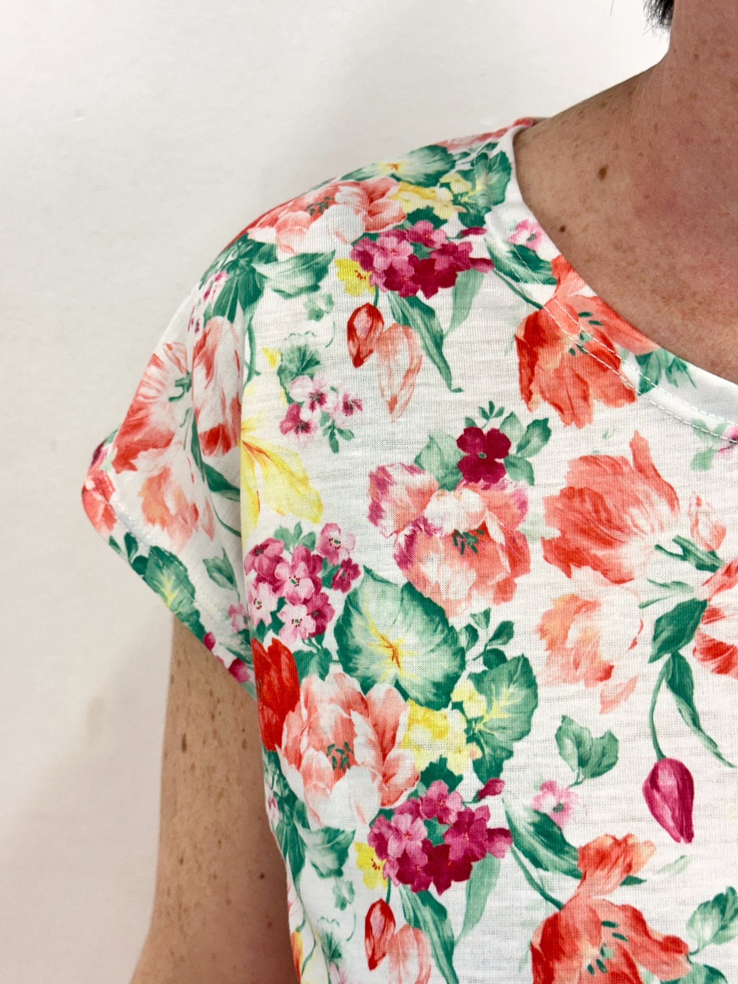 Samarreta flors verdes i taronges